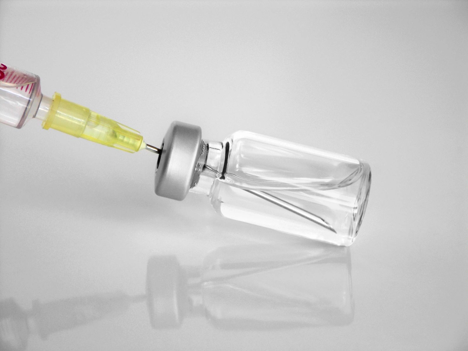 Syringe in vial